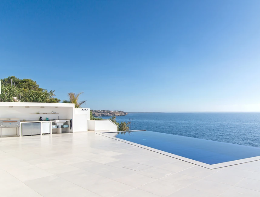 Modern and new villa frontline to the sea in Cala Pi-17