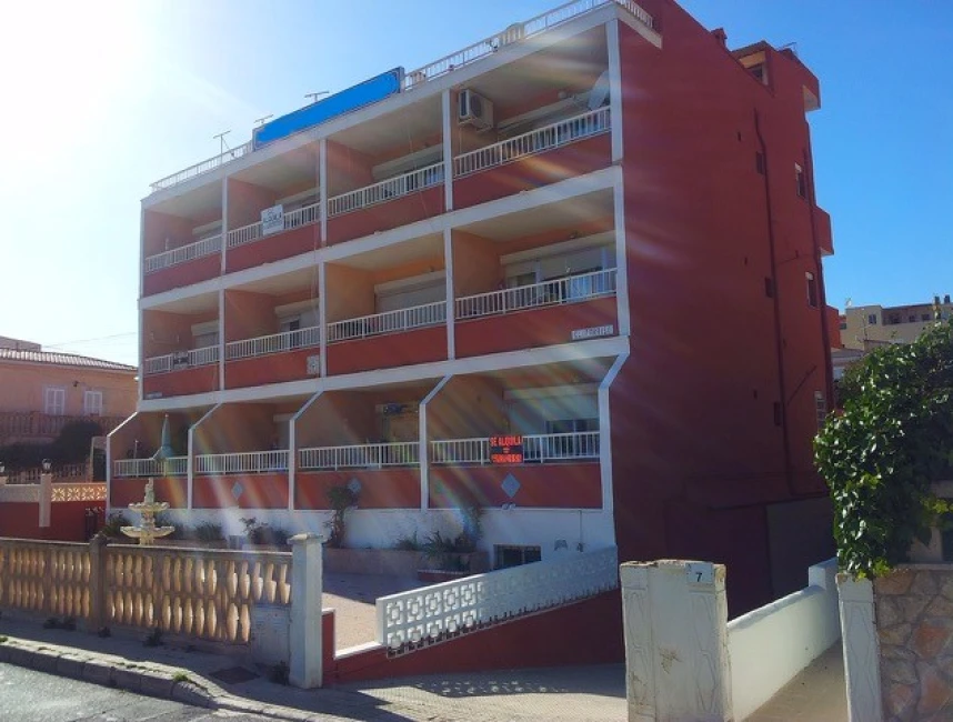 Apartment building to renovate in Paguera-1